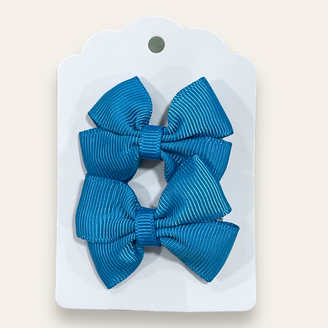 Pinches de colores con pin de metal