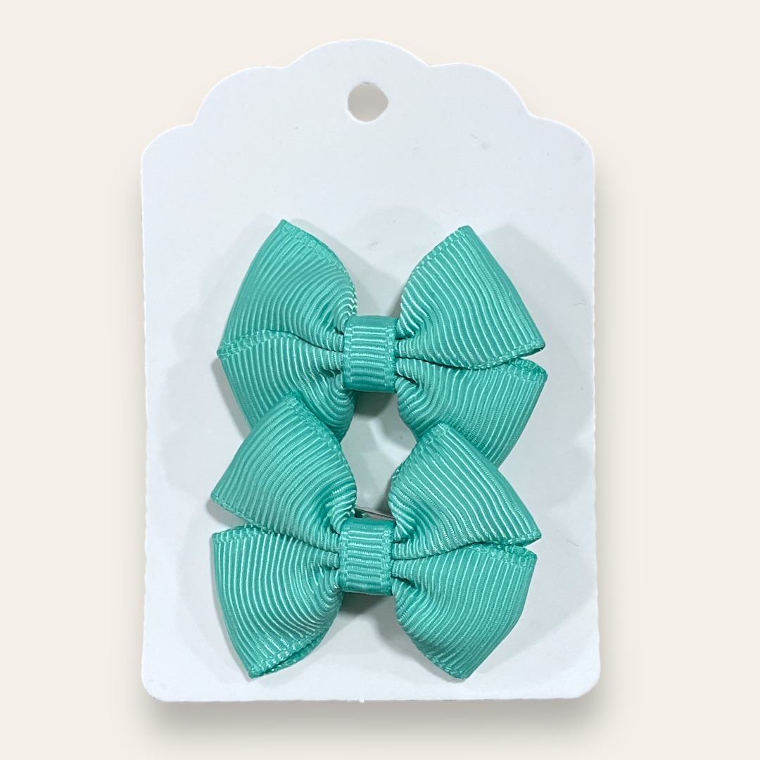 Pinches de colores con pin de metal