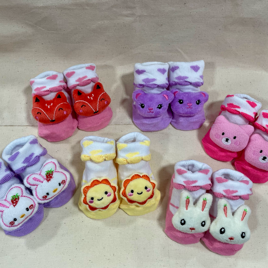 Calcetin antideslizante con peluche beba